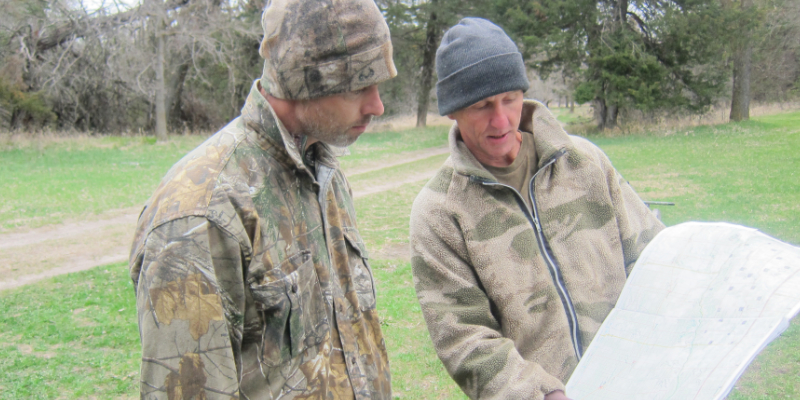 Eddie Claypool and the Camo Matrix creator planning a hunt over a map